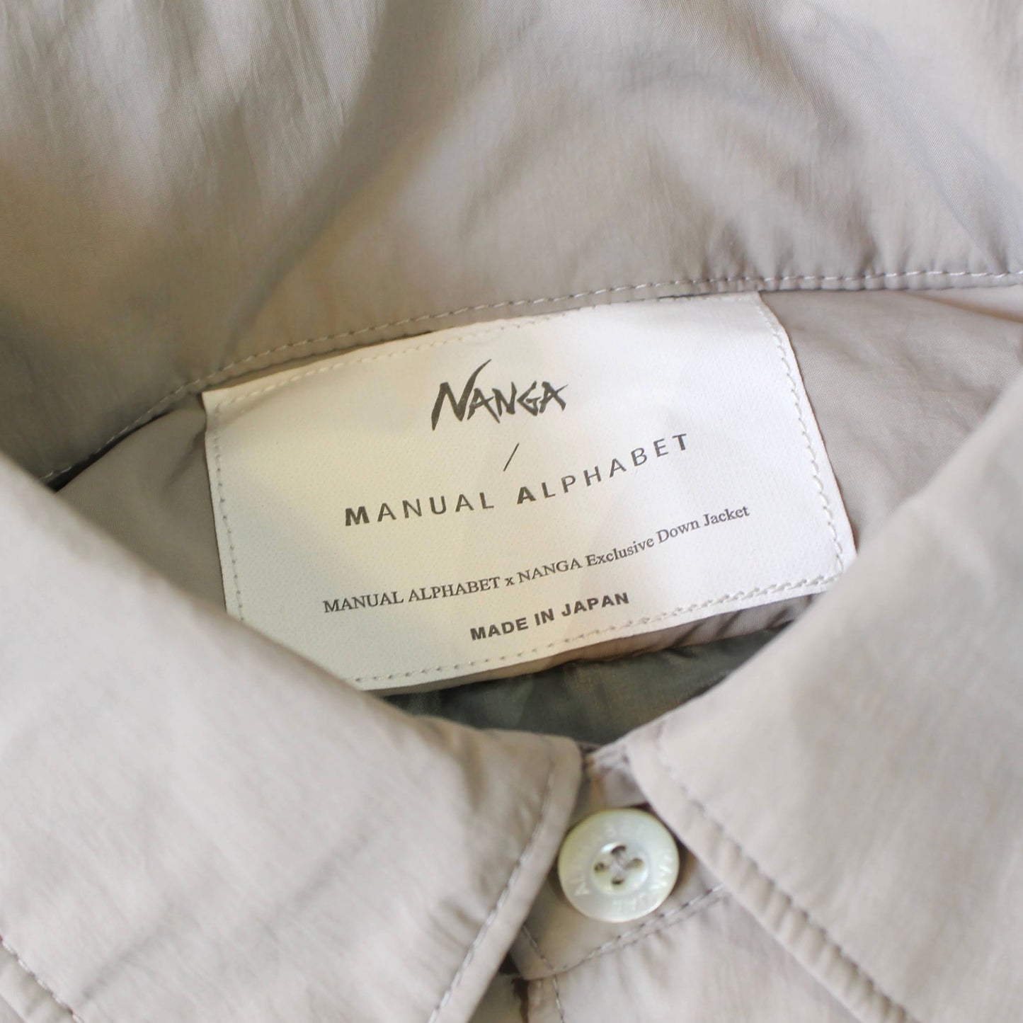 NANGA X MANUAL ALPHABET
-SUPER LIGHT DOWN SHIRT JACKET