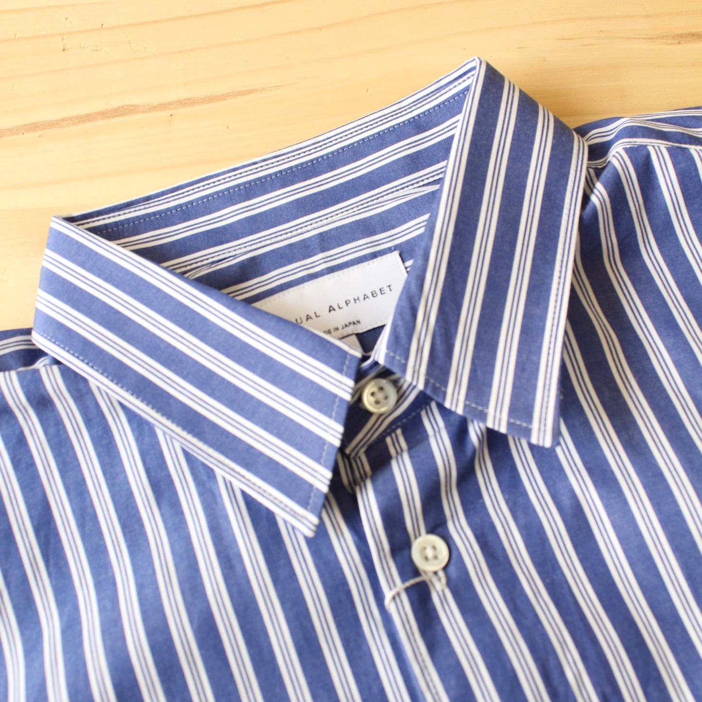 MANUAL ALPHABET -
80/2 STRIPE SHIRT BULGING FIT