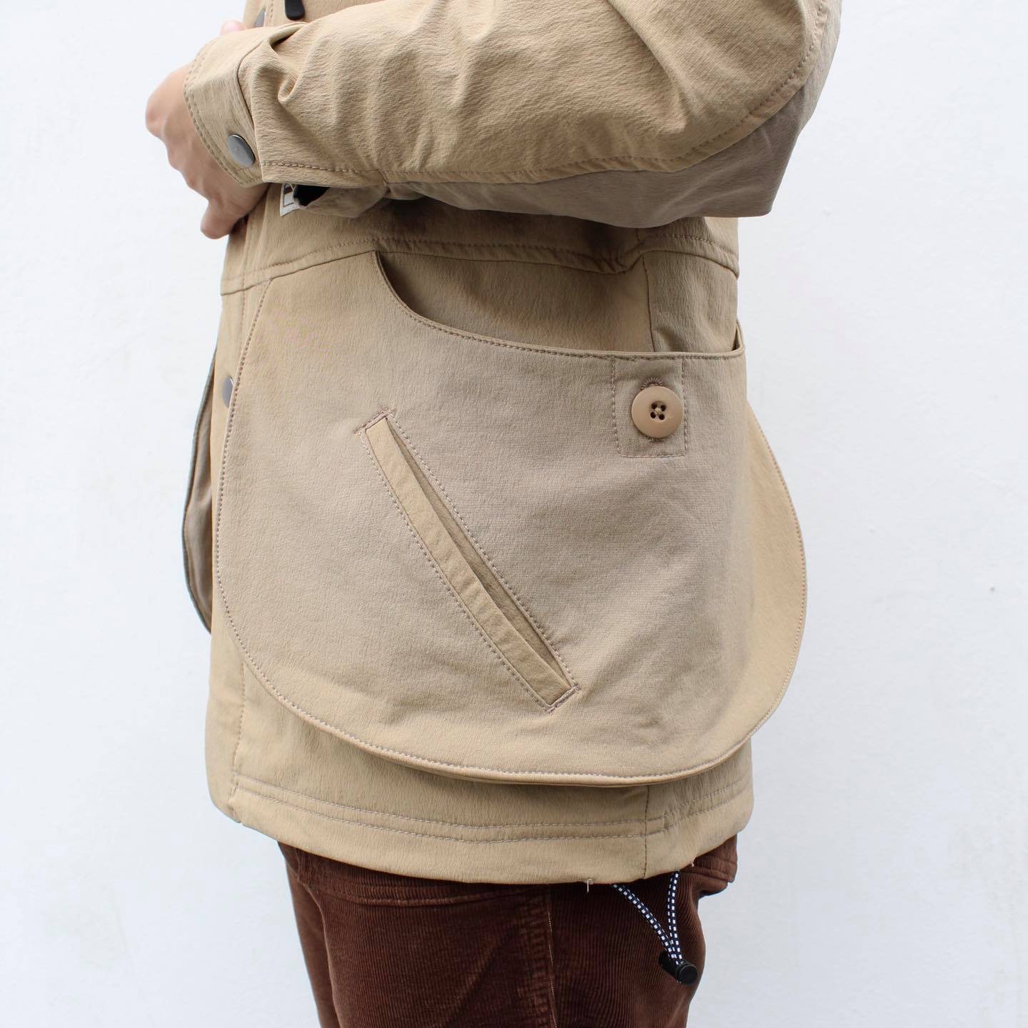 WILDERNESS EXPERIENCE - STORAGE POCKET COLLARLESS JACKET