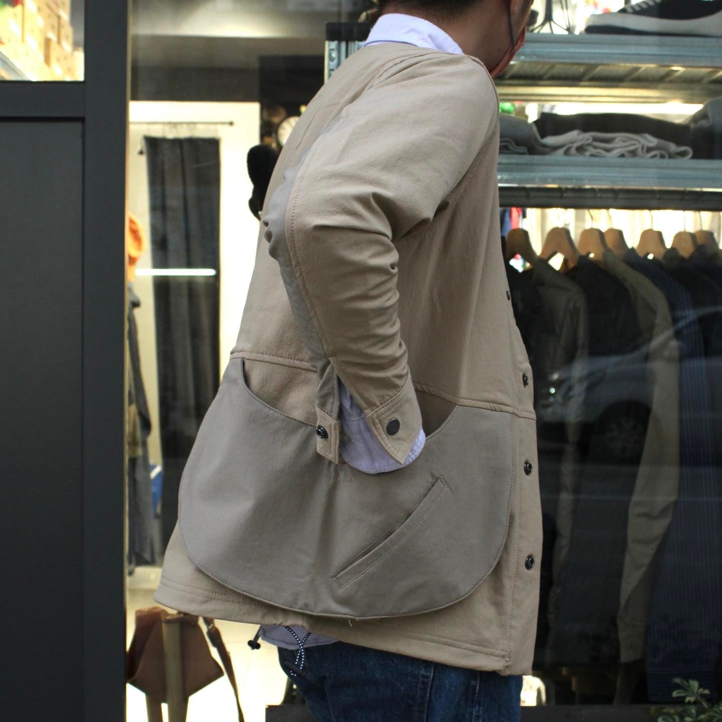 WILDERNESS EXPERIENCE - STORAGE POCKET COLLARLESS JACKET