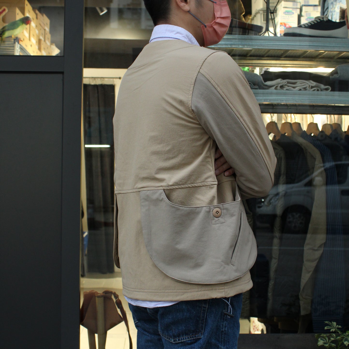 WILDERNESS EXPERIENCE - STORAGE POCKET COLLARLESS JACKET