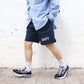 MILITARY DEADSTOCK COLLECTION - 
NAVY TRAINER SHORTS