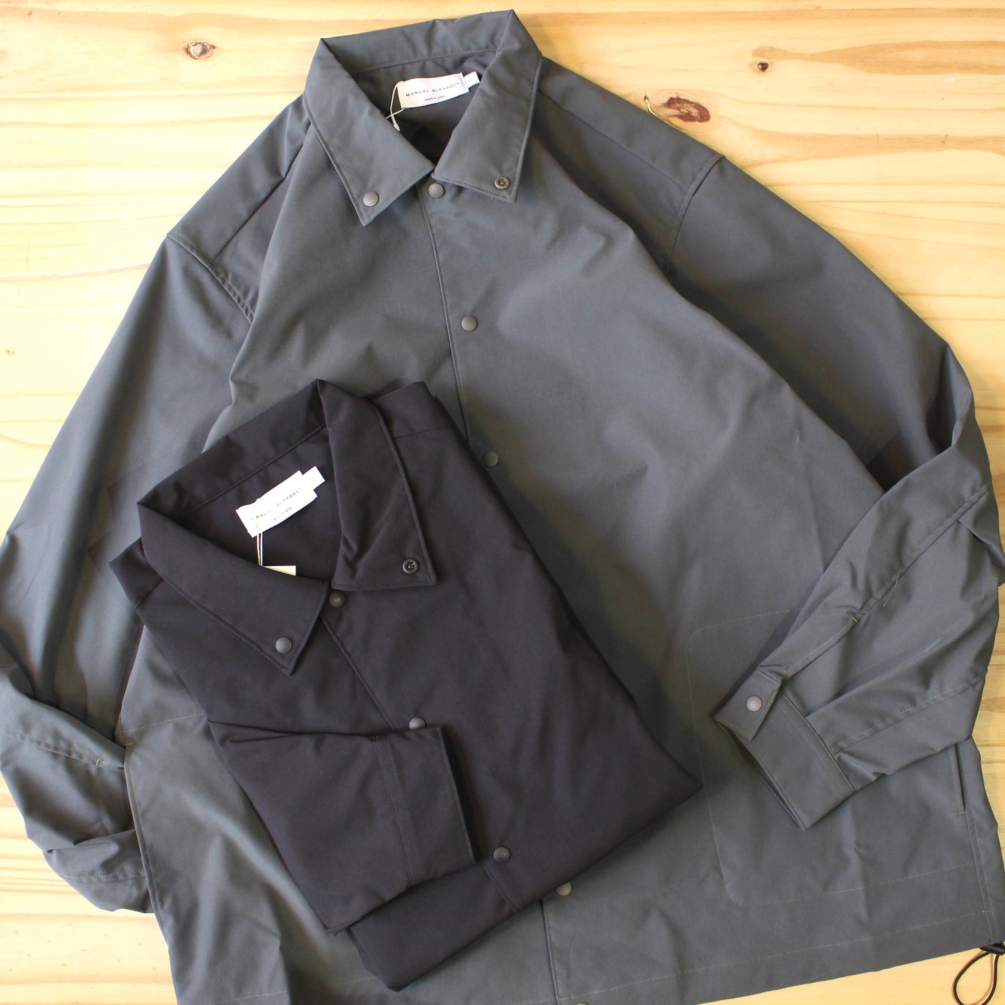 MANUAL ALPHABET - 
WEATHER CLOTH SPINDLE SHIRTS
