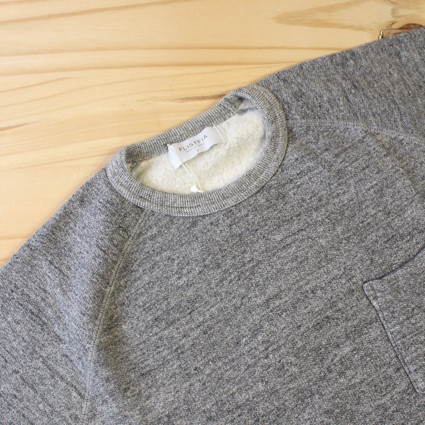 FLISTFIA -
 CREW NECK POCKET SWEAT