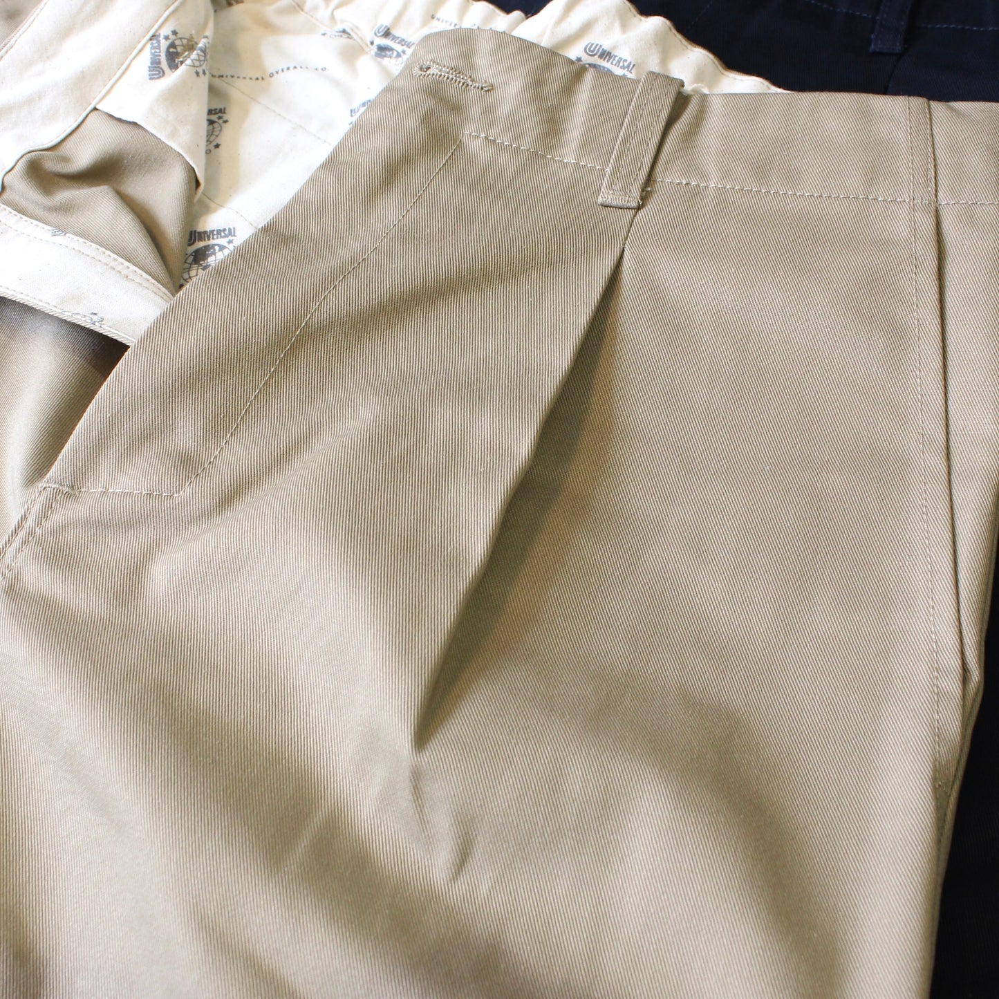 UNIVERSAL OVERALL Japanese version-CLASSIC COLLECTION TUCK TAPERED PANTS