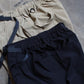 GRAMICCI -
 PERFORMANCE
 SHELTECH x RENU CHUCKWALLA SHORTS