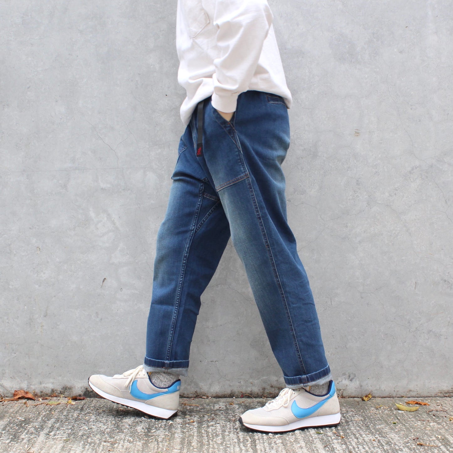 GRAMICCI - 
LOOSE TAPERED DENIM PANTS