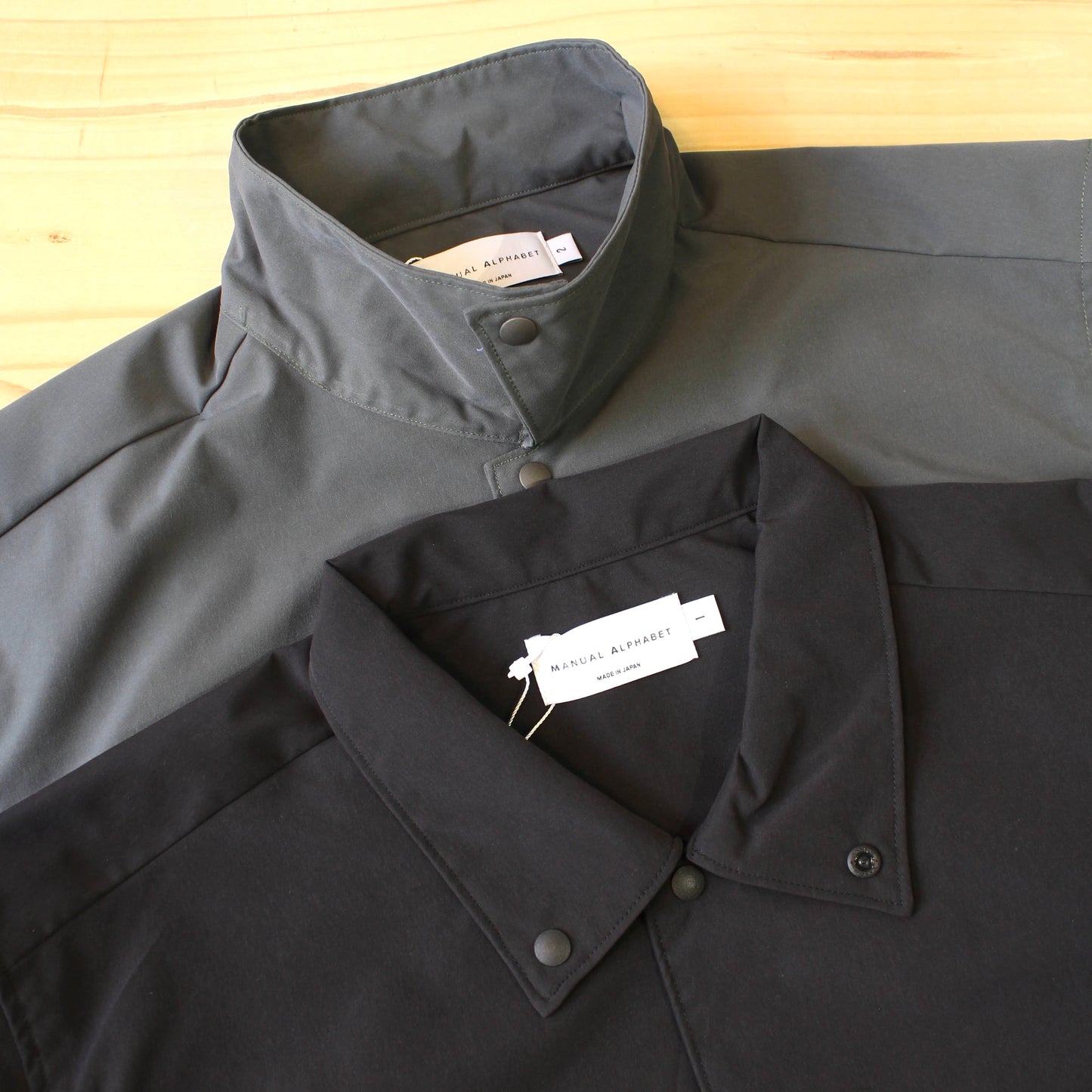 MANUAL ALPHABET - 
WEATHER CLOTH SPINDLE SHIRTS